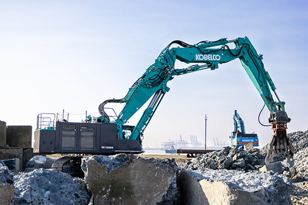 Excavator demolition booms