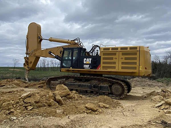 Excavator Rock Arm and Breaker Comparing Working Conditions