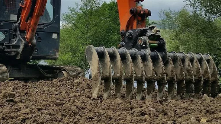 excavator root rake